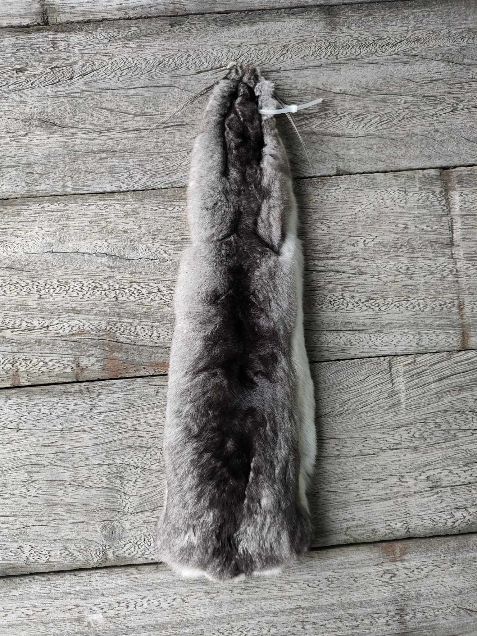 Fur lined accessory made from high-quality pelts, artisanal craftsmanship, ethical sourcing, perfect for winter fashion.